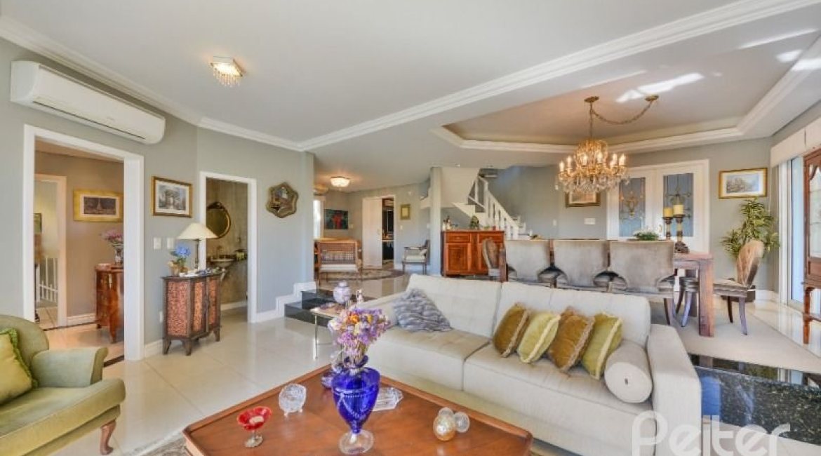 Casa à venda com 399m², 3 dormitórios, 3 suítes, 4 vagas, no bairro Nonoai em Porto Alegre