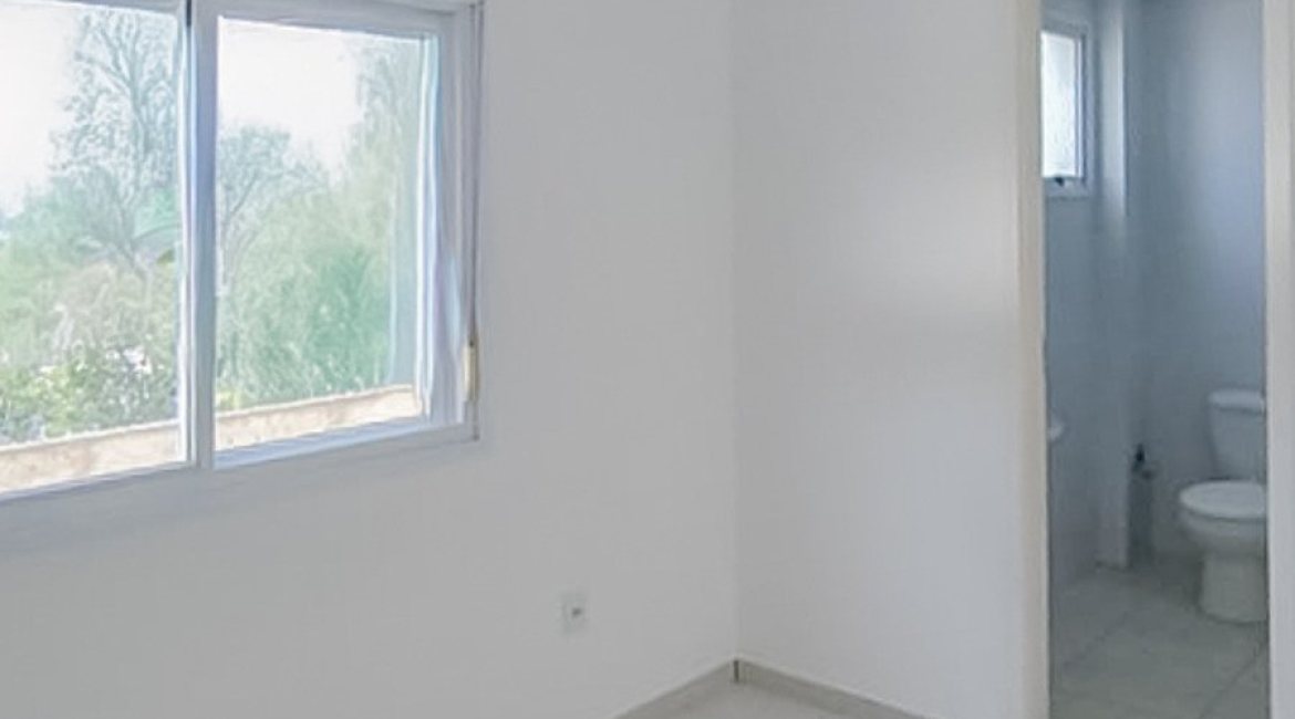 Apartamento à venda com 65m², 2 dormitórios, 1 suíte, 1 vaga, no bairro Camaquã em Porto Alegre