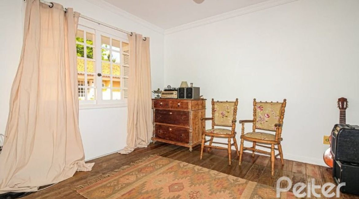 Casa em Condomínio à venda com 191m², 4 dormitórios, 2 suítes, 2 vagas, no bairro Jardim Isabel em Porto Alegre