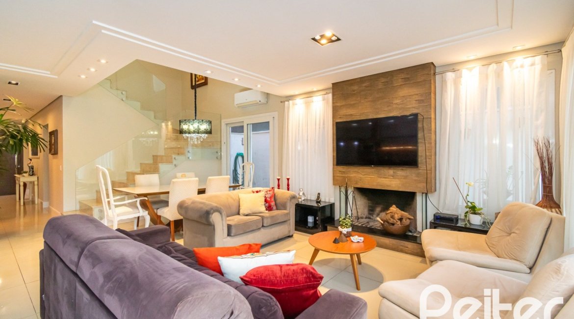 Casa em Condomínio à venda com 220m², 4 dormitórios, 4 suítes, 2 vagas, no bairro Terra Ville em PORTO ALEGRE