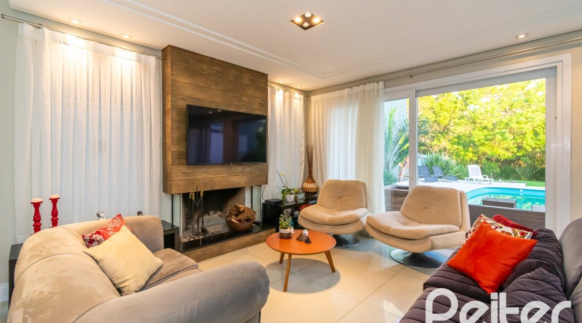 Casa em Condomínio à venda com 220m², 4 dormitórios, 4 suítes, 2 vagas, no bairro Terra Ville em PORTO ALEGRE