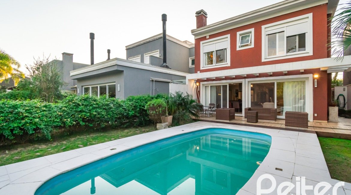 Casa em Condomínio à venda com 220m², 4 dormitórios, 4 suítes, 2 vagas, no bairro Terra Ville em PORTO ALEGRE