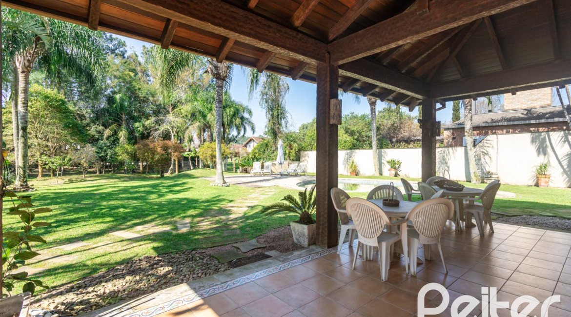 Casa em Condomínio à venda com 400m², 3 dormitórios, 3 suítes, 2 vagas, no bairro Terra Ville em Porto Alegre