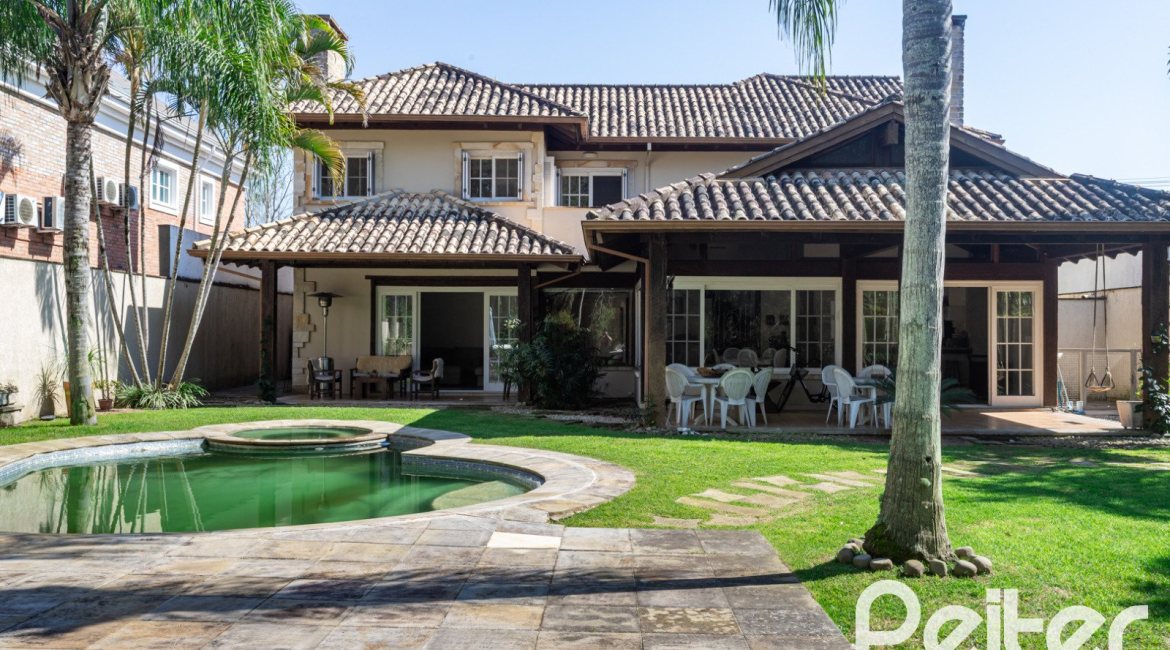 Casa em Condomínio à venda com 400m², 3 dormitórios, 3 suítes, 2 vagas, no bairro Terra Ville em Porto Alegre