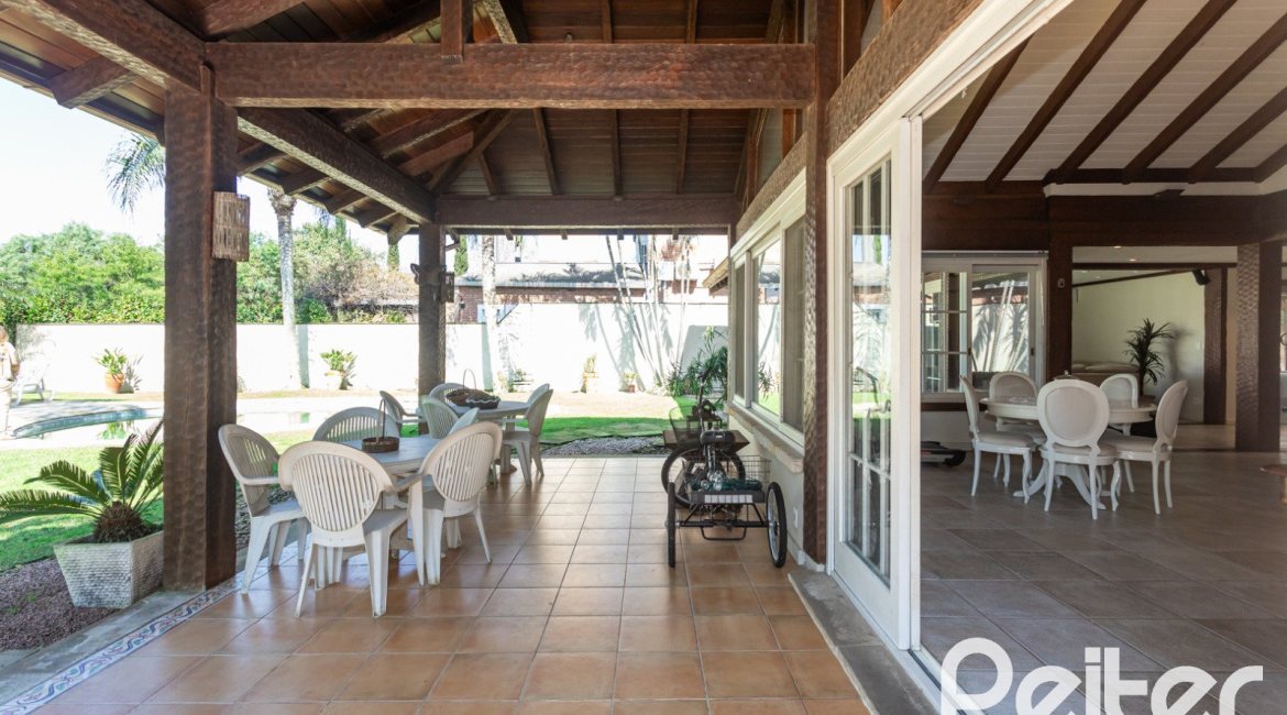 Casa em Condomínio à venda com 400m², 3 dormitórios, 3 suítes, 2 vagas, no bairro Terra Ville em Porto Alegre