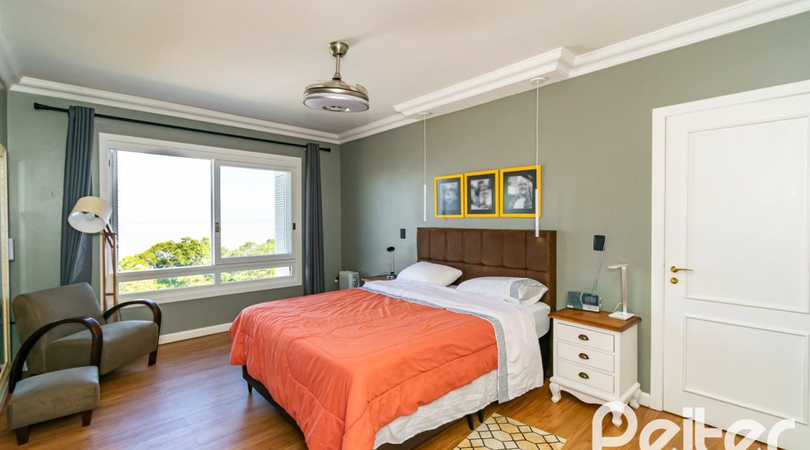 Casa à venda com 413m², 3 dormitórios, 3 suítes, 4 vagas, no bairro Sétimo Céu em Porto Alegre