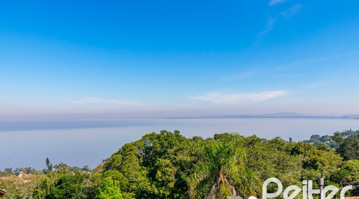 Casa à venda com 413m², 3 dormitórios, 3 suítes, 4 vagas, no bairro Sétimo Céu em Porto Alegre