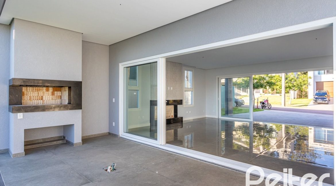 Casa em Condomínio à venda com 293m², 4 dormitórios, 4 suítes, 2 vagas, no bairro Alphaville em PORTO ALEGRE