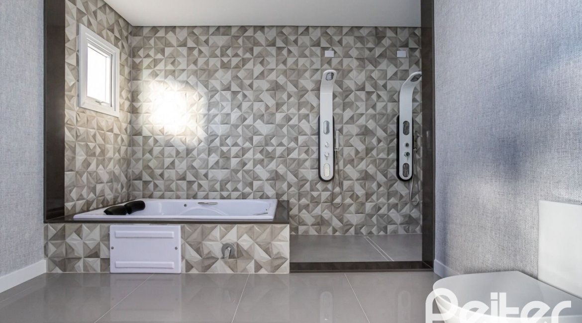 Casa em Condomínio à venda com 293m², 4 dormitórios, 4 suítes, 2 vagas, no bairro Alphaville em PORTO ALEGRE