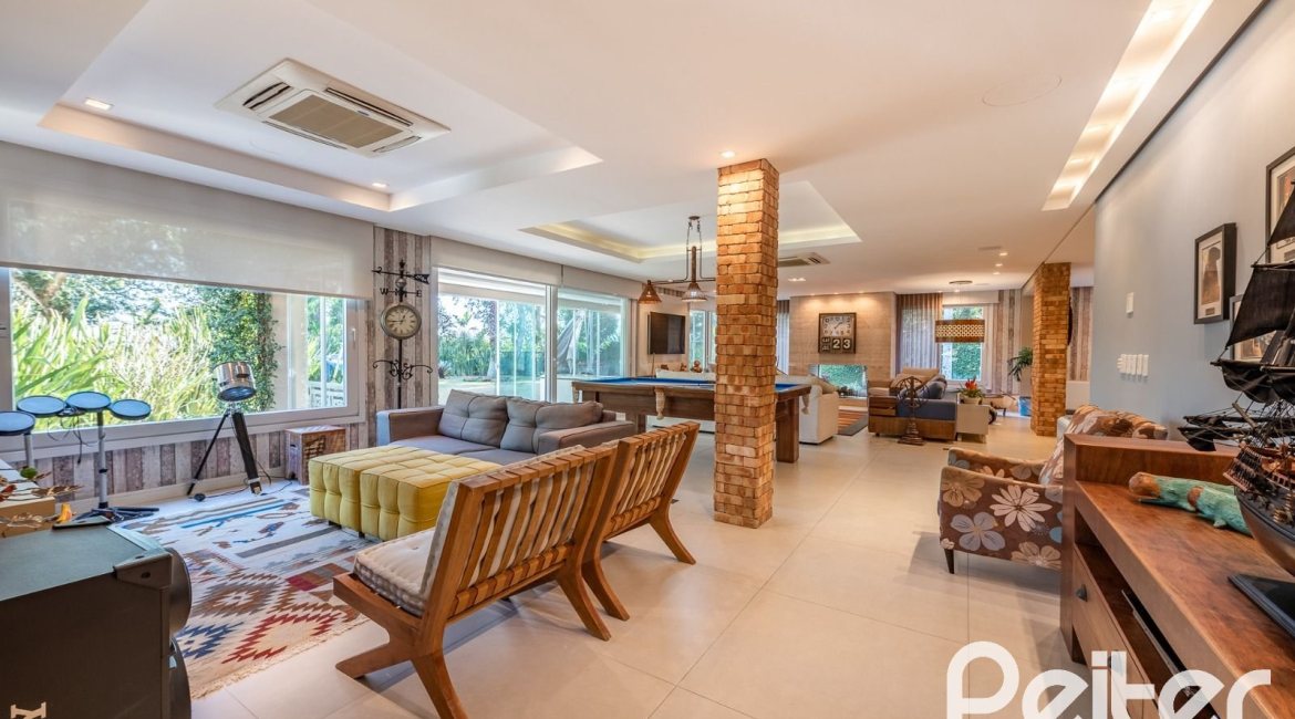 Casa em Condomínio à venda com 568m², 4 dormitórios, 4 suítes, 5 vagas, no bairro Pedra Redonda em PORTO ALEGRE