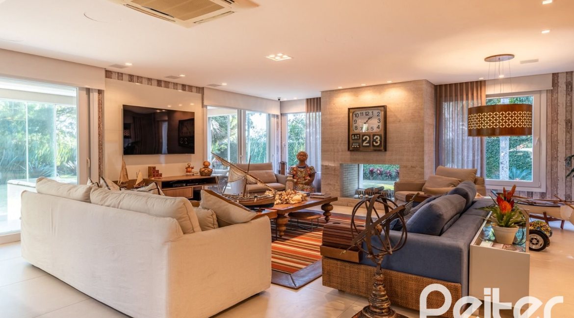 Casa em Condomínio à venda com 568m², 4 dormitórios, 4 suítes, 5 vagas, no bairro Pedra Redonda em PORTO ALEGRE