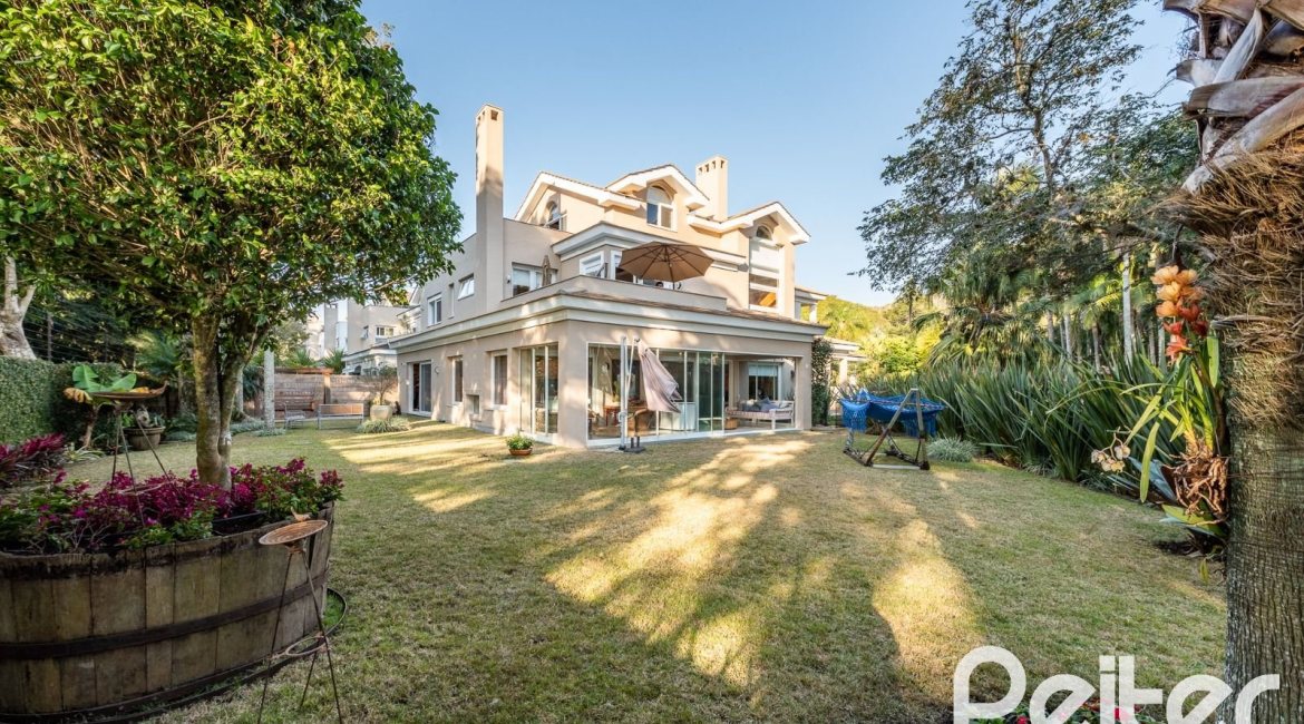 Casa em Condomínio à venda com 568m², 4 dormitórios, 4 suítes, 5 vagas, no bairro Pedra Redonda em PORTO ALEGRE