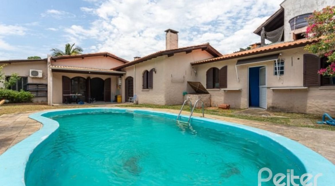 Casa à venda com 361m², 4 dormitórios, 1 suíte, 3 vagas, no bairro Vila Assunção em Porto Alegre