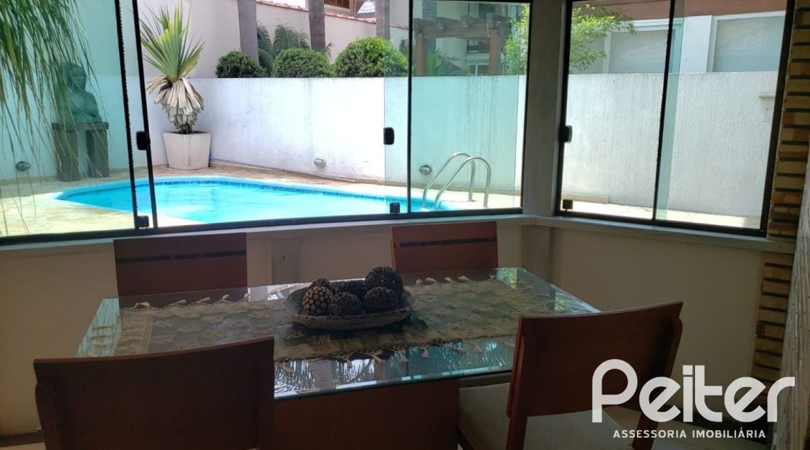 Casa em Condomínio à venda com 300m², 3 dormitórios, 3 suítes, 3 vagas, no bairro Ipanema em Porto Alegre