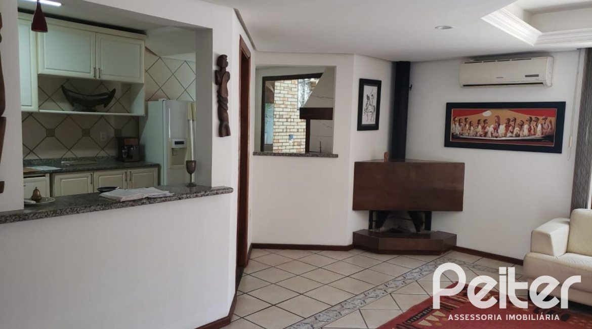 Casa em Condomínio à venda com 300m², 3 dormitórios, 3 suítes, 3 vagas, no bairro Ipanema em Porto Alegre