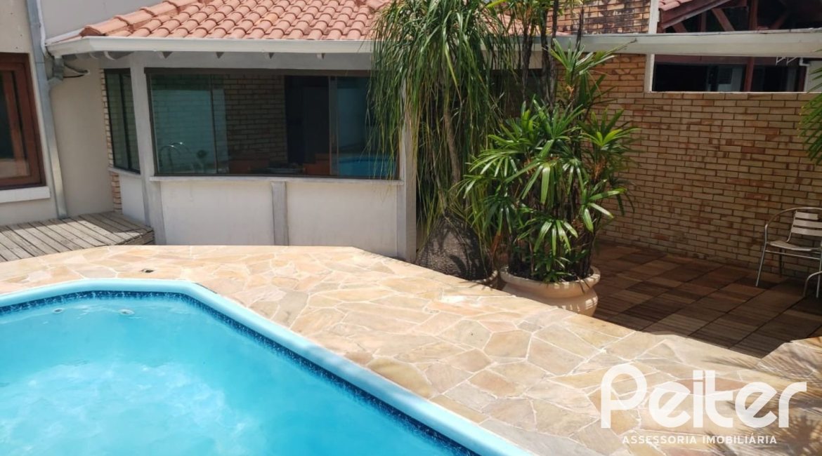 Casa em Condomínio à venda com 300m², 3 dormitórios, 3 suítes, 3 vagas, no bairro Ipanema em Porto Alegre