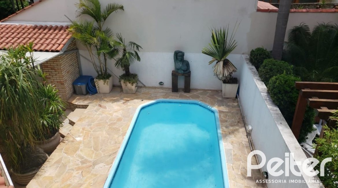 Casa em Condomínio à venda com 300m², 3 dormitórios, 3 suítes, 3 vagas, no bairro Ipanema em Porto Alegre