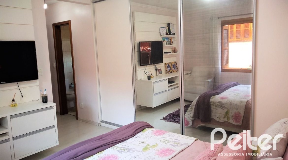 Casa em Condomínio à venda com 148m², 3 dormitórios, 1 suíte, 2 vagas, no bairro Guarujá em Porto Alegre