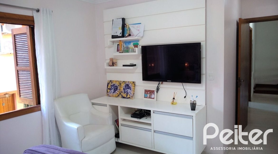 Casa em Condomínio à venda com 148m², 3 dormitórios, 1 suíte, 2 vagas, no bairro Guarujá em Porto Alegre