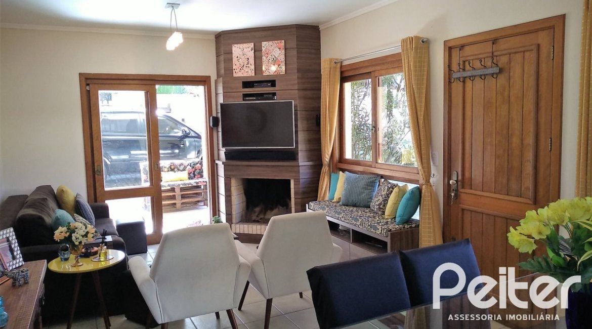 Casa em Condomínio à venda com 148m², 3 dormitórios, 1 suíte, 2 vagas, no bairro Guarujá em Porto Alegre