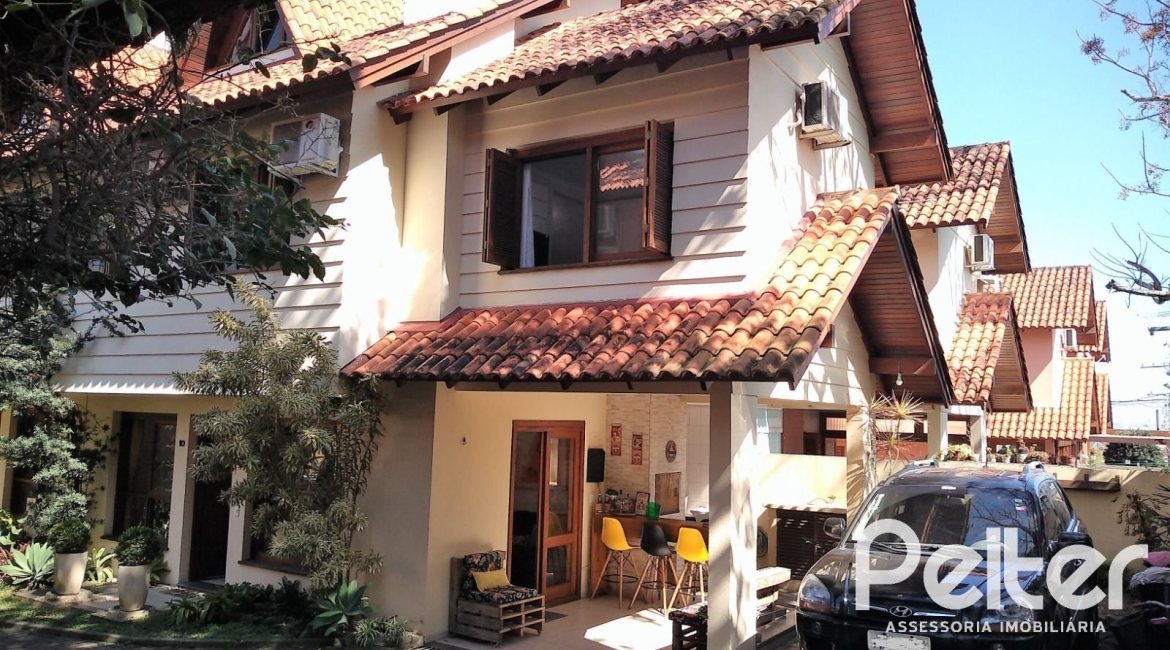 Casa em Condomínio à venda com 148m², 3 dormitórios, 1 suíte, 2 vagas, no bairro Guarujá em Porto Alegre