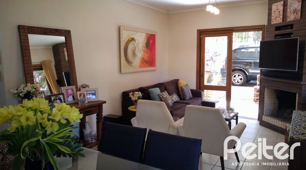 Casa em Condomínio à venda com 148m², 3 dormitórios, 1 suíte, 2 vagas, no bairro Guarujá em Porto Alegre