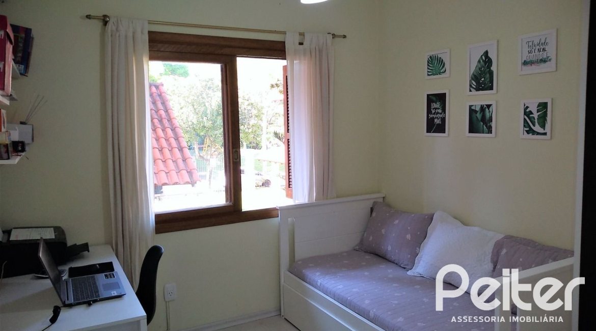 Casa em Condomínio à venda com 148m², 3 dormitórios, 1 suíte, 2 vagas, no bairro Guarujá em Porto Alegre