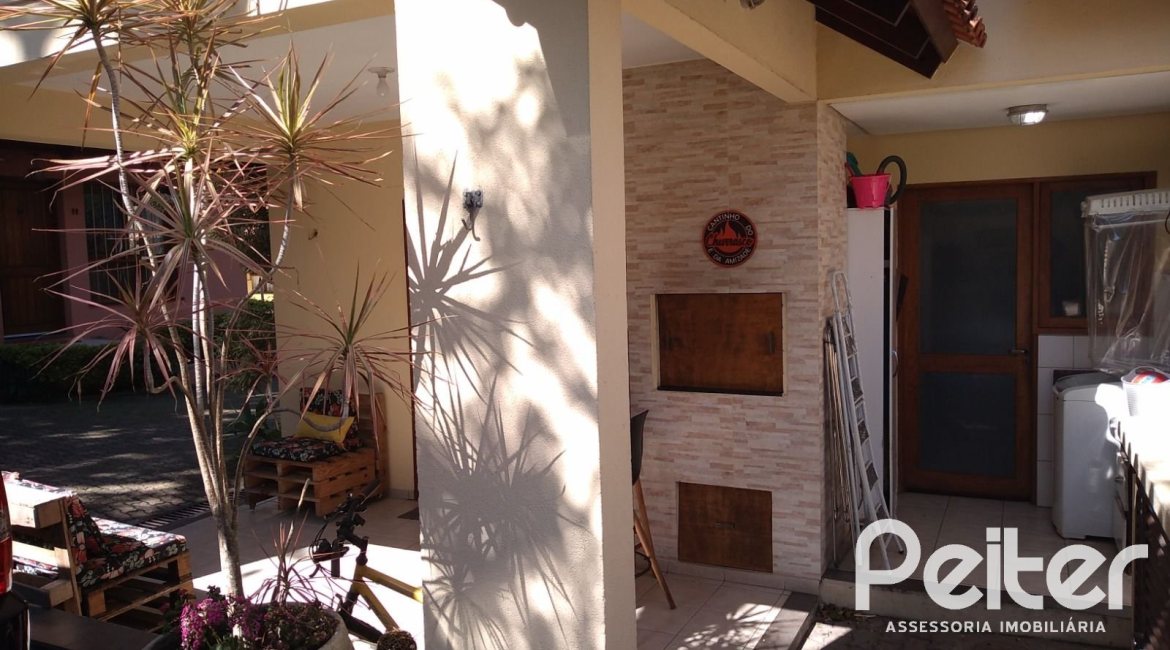 Casa em Condomínio à venda com 148m², 3 dormitórios, 1 suíte, 2 vagas, no bairro Guarujá em Porto Alegre