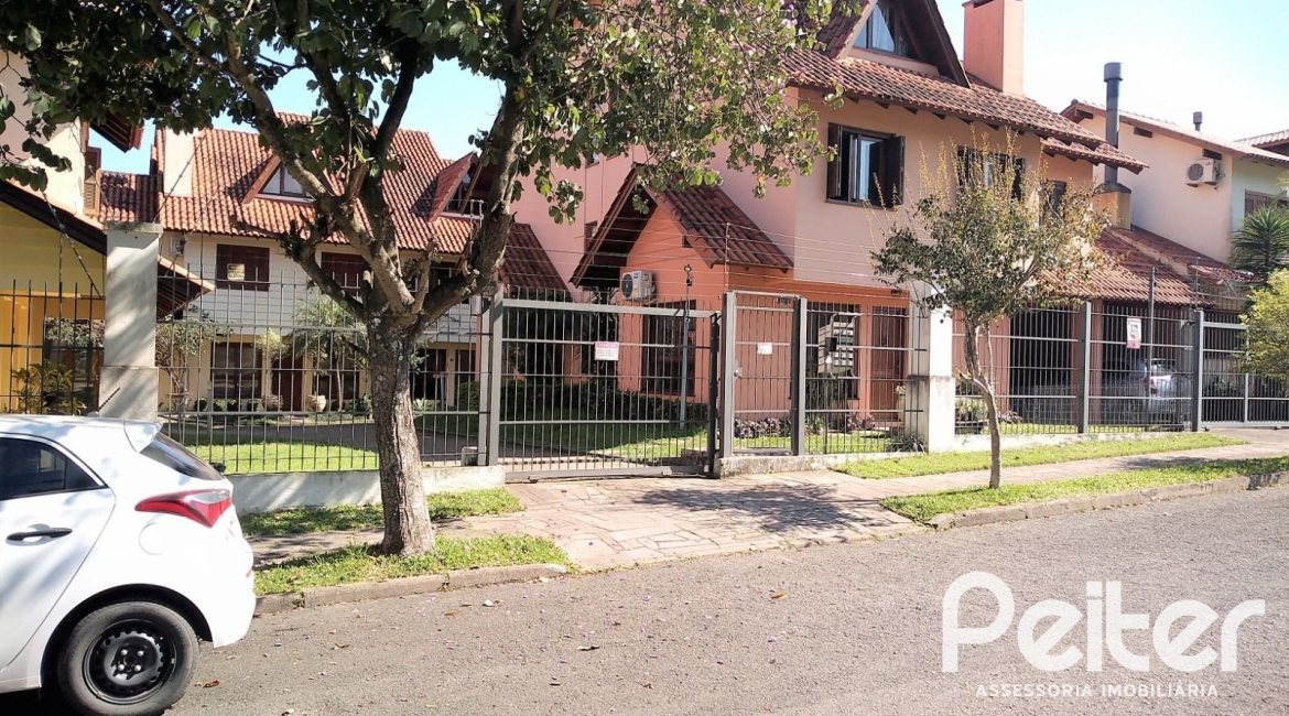 Casa em Condomínio à venda com 148m², 3 dormitórios, 1 suíte, 2 vagas, no bairro Guarujá em Porto Alegre