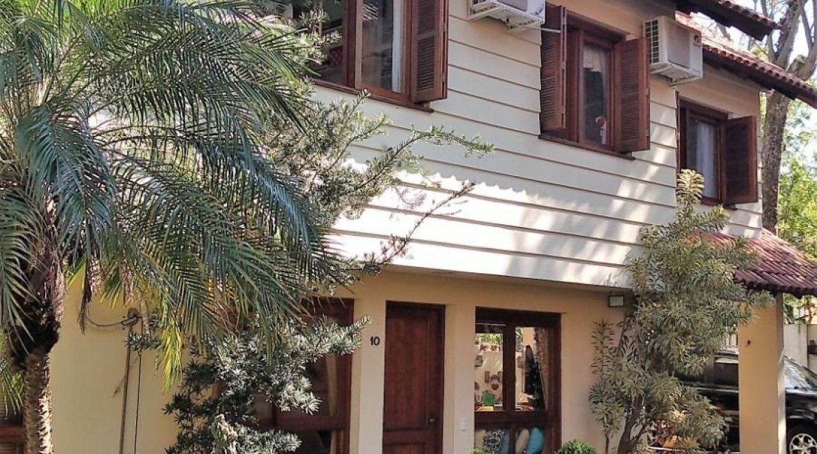 Casa em Condomínio à venda com 148m², 3 dormitórios, 1 suíte, 2 vagas, no bairro Guarujá em Porto Alegre