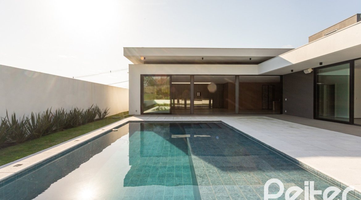 Casa em Condomínio à venda com 434m², 4 dormitórios, 4 suítes, 6 vagas, no bairro Terra Ville em PORTO ALEGRE
