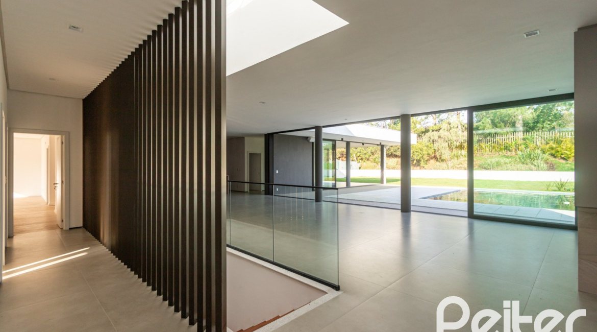 Casa em Condomínio à venda com 434m², 4 dormitórios, 4 suítes, 6 vagas, no bairro Terra Ville em PORTO ALEGRE