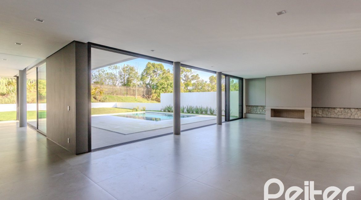 Casa em Condomínio à venda com 434m², 4 dormitórios, 4 suítes, 6 vagas, no bairro Terra Ville em PORTO ALEGRE
