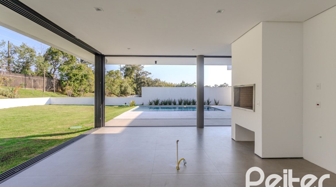 Casa em Condomínio à venda com 434m², 4 dormitórios, 4 suítes, 6 vagas, no bairro Terra Ville em PORTO ALEGRE