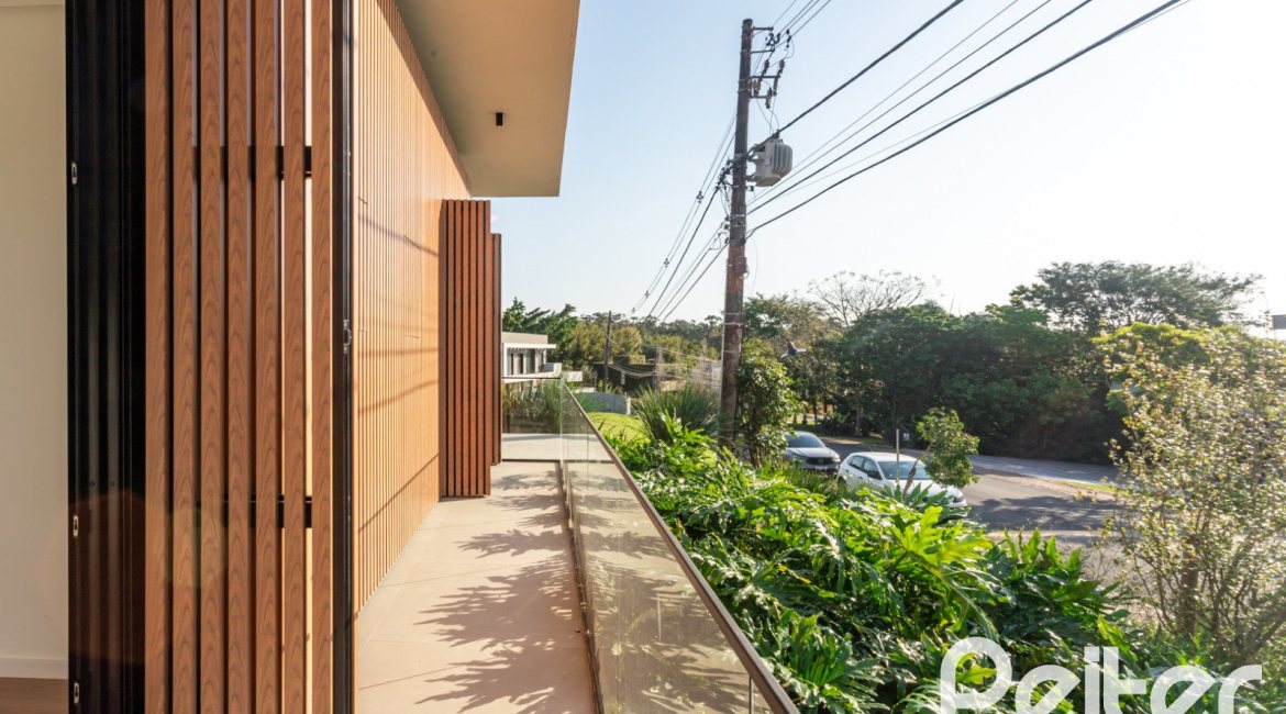 Casa em Condomínio à venda com 434m², 4 dormitórios, 4 suítes, 6 vagas, no bairro Terra Ville em PORTO ALEGRE