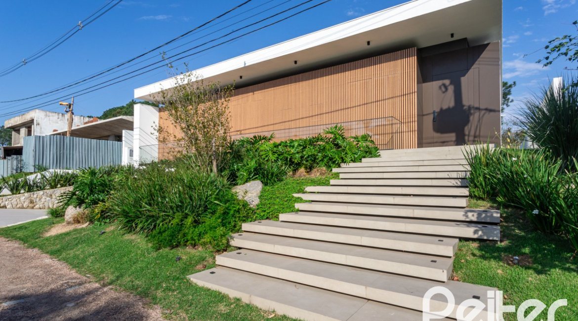Casa em Condomínio à venda com 434m², 4 dormitórios, 4 suítes, 6 vagas, no bairro Terra Ville em PORTO ALEGRE