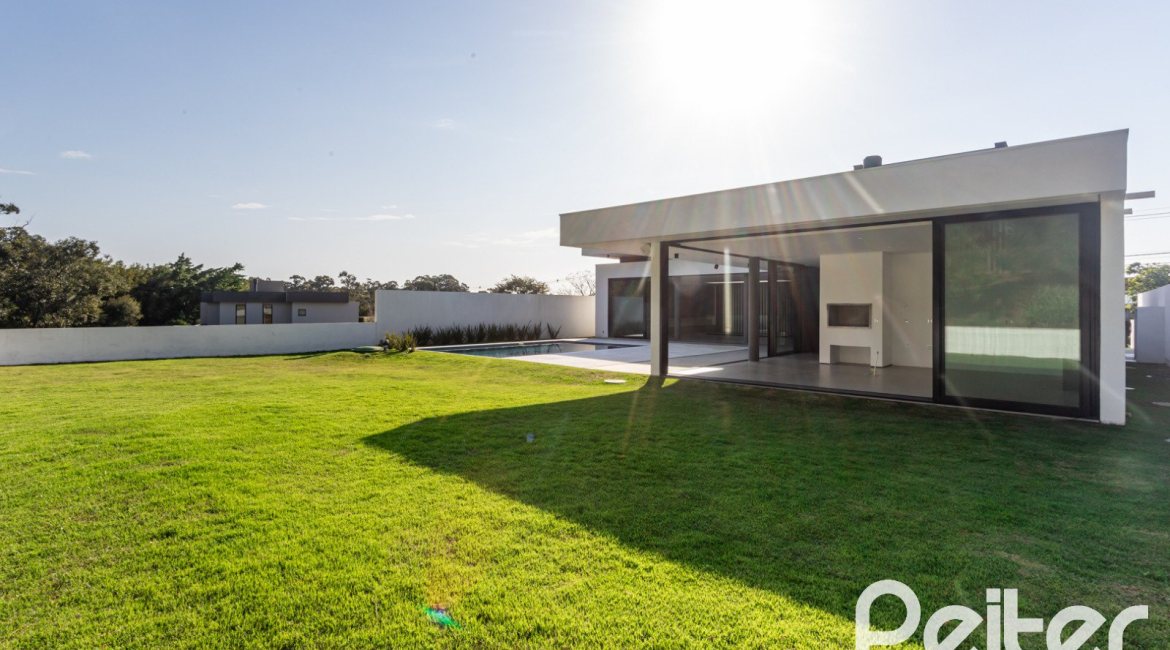 Casa em Condomínio à venda com 434m², 4 dormitórios, 4 suítes, 6 vagas, no bairro Terra Ville em PORTO ALEGRE
