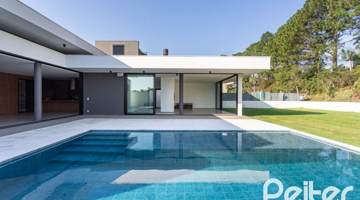 Casa em Condomínio à venda com 434m², 4 dormitórios, 4 suítes, 6 vagas, no bairro Terra Ville em PORTO ALEGRE