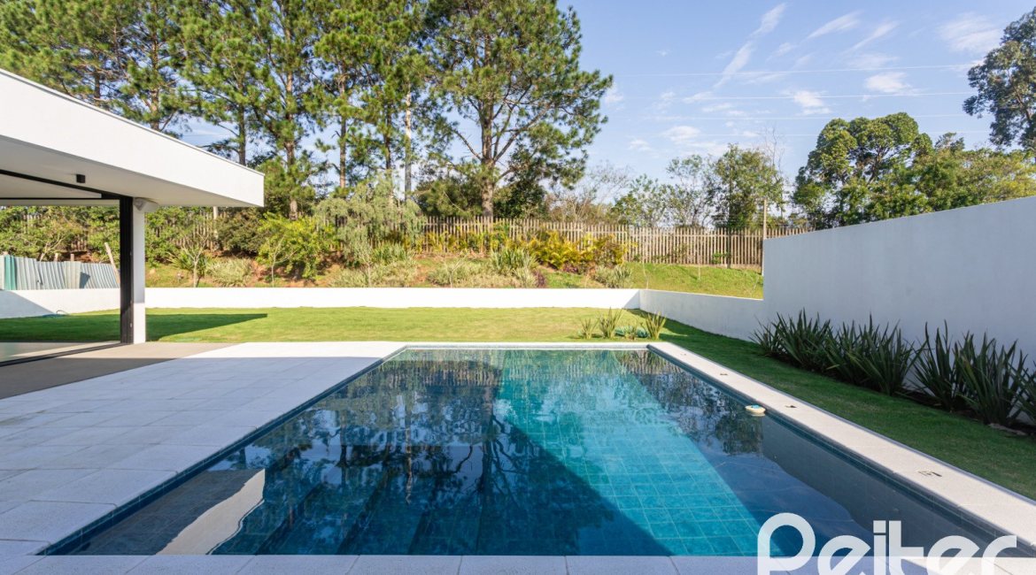 Casa em Condomínio à venda com 434m², 4 dormitórios, 4 suítes, 6 vagas, no bairro Terra Ville em PORTO ALEGRE