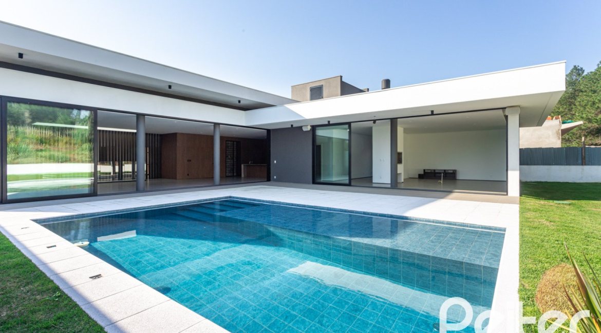 Casa em Condomínio à venda com 434m², 4 dormitórios, 4 suítes, 6 vagas, no bairro Terra Ville em PORTO ALEGRE