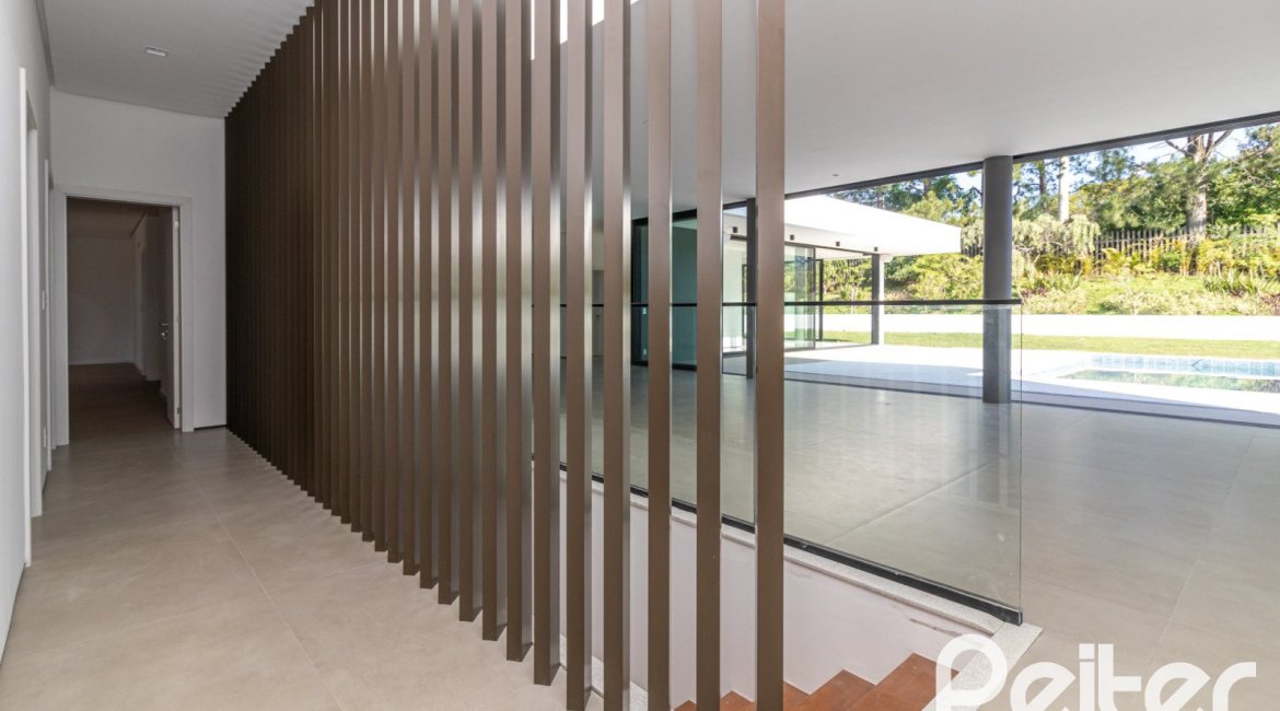 Casa em Condomínio à venda com 434m², 4 dormitórios, 4 suítes, 6 vagas, no bairro Terra Ville em PORTO ALEGRE