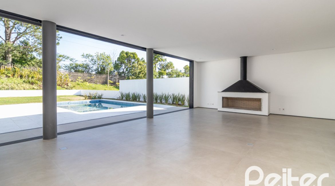 Casa em Condomínio à venda com 434m², 4 dormitórios, 4 suítes, 6 vagas, no bairro Terra Ville em PORTO ALEGRE