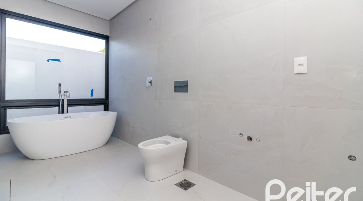 Casa em Condomínio à venda com 434m², 4 dormitórios, 4 suítes, 6 vagas, no bairro Terra Ville em PORTO ALEGRE