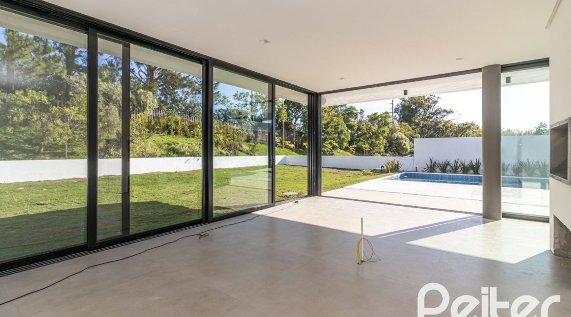 Casa em Condomínio à venda com 434m², 4 dormitórios, 4 suítes, 6 vagas, no bairro Terra Ville em PORTO ALEGRE