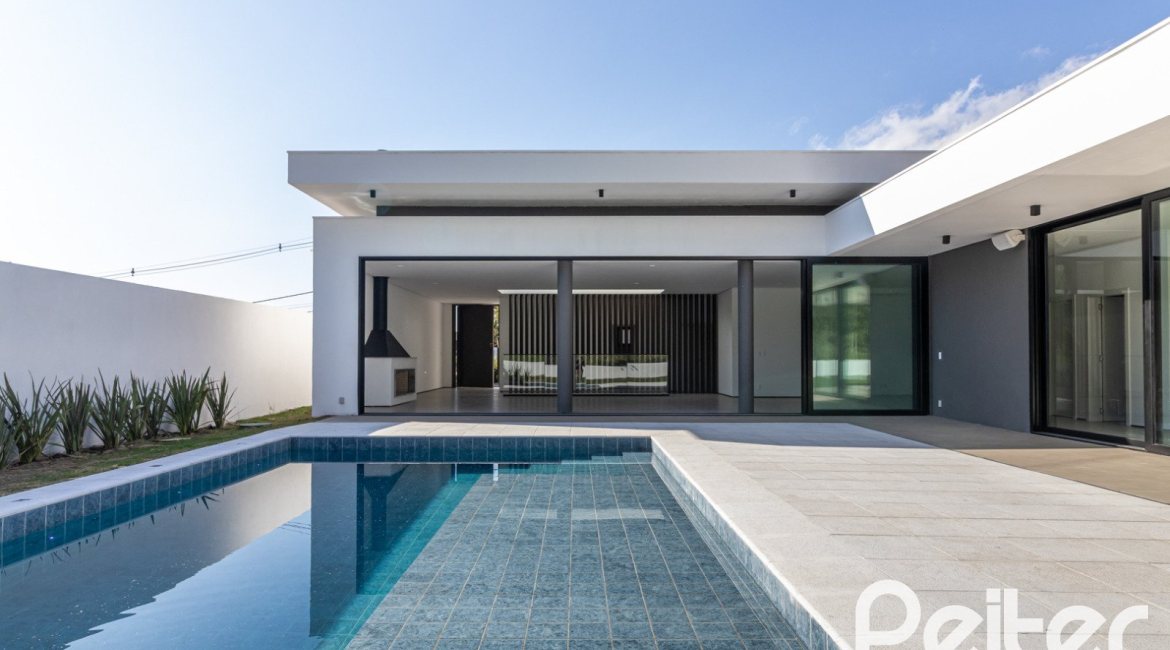 Casa em Condomínio à venda com 434m², 4 dormitórios, 4 suítes, 6 vagas, no bairro Terra Ville em PORTO ALEGRE