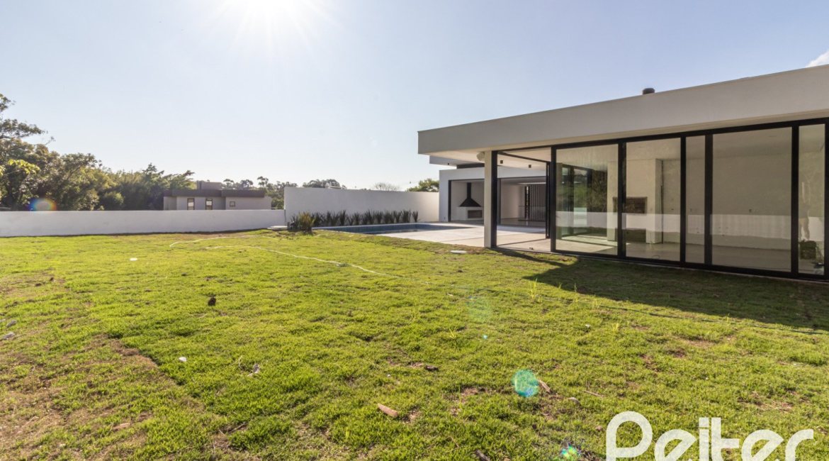 Casa em Condomínio à venda com 434m², 4 dormitórios, 4 suítes, 6 vagas, no bairro Terra Ville em PORTO ALEGRE