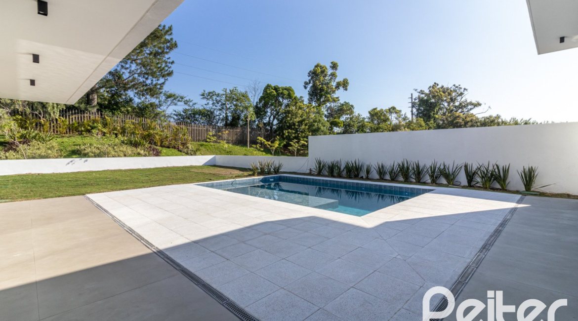 Casa em Condomínio à venda com 434m², 4 dormitórios, 4 suítes, 6 vagas, no bairro Terra Ville em PORTO ALEGRE