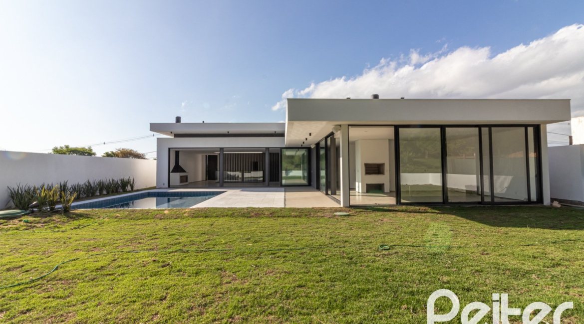Casa em Condomínio à venda com 434m², 4 dormitórios, 4 suítes, 6 vagas, no bairro Terra Ville em PORTO ALEGRE
