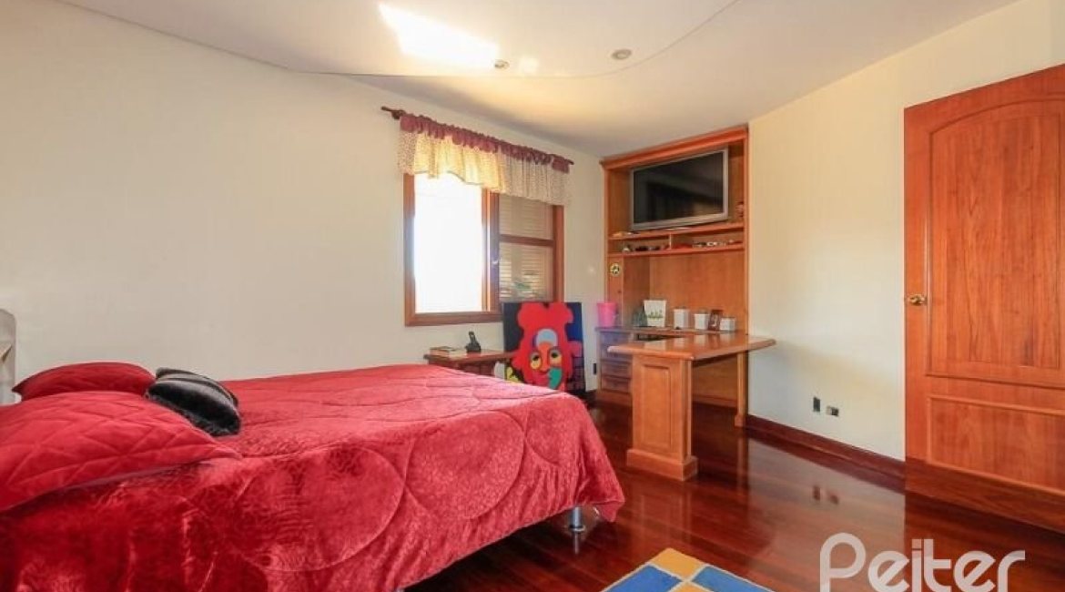 Casa em Condomínio à venda com 609m², 6 dormitórios, 2 suítes, 3 vagas, no bairro Cavalhada em PORTO ALEGRE