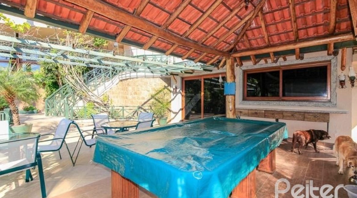 Casa em Condomínio à venda com 609m², 6 dormitórios, 2 suítes, 3 vagas, no bairro Cavalhada em PORTO ALEGRE